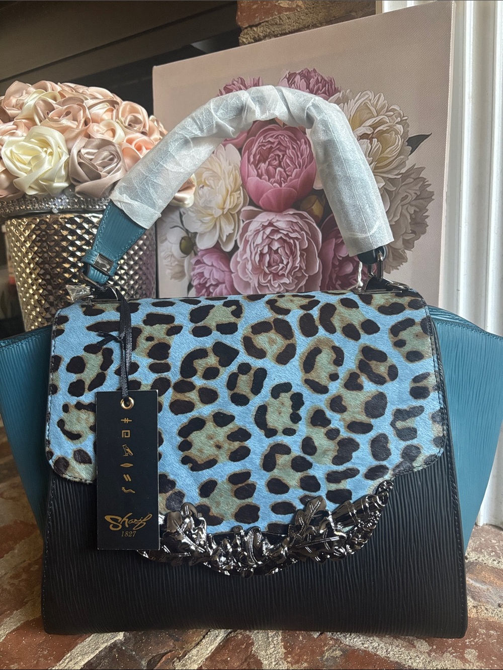 Sharif Legacy Haircalf and Epi Leather Engraved Leaf Satchel.